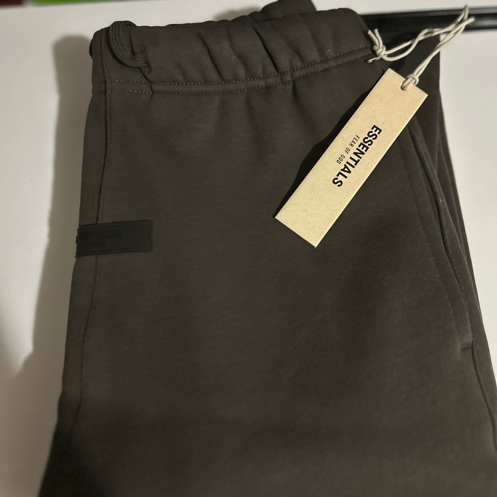 Essentials Dark Black Sweatpants - image 1